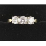 An 18ct yellow gold three-stone diamond ring, total diamond weight approx 1.