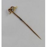 A Victorian yellow gold knot tie pin, approx 2g.