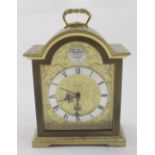 Swiza; a Tempus Fugit brass-cased mantel clock, height 15cm.