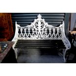 A Victorian heavy cast iron garden bench in the Coalbrookdale style,