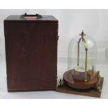 An electrometer with glass dome by Elliot Brothers of London,