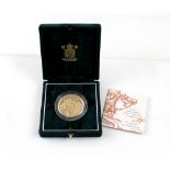 A 1999 £5 gold coin in 'The Royal Mint Presentation Pack', numbered 0294, boxed.