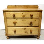 A 19th century pine chest of three long drawers on bun feet, approx 80 x 90cm (af).