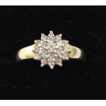 A 9ct yellow gold diamond cluster ring, size P, approx 2.7g.