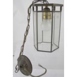 A brass lantern with bevelled glass shade, height 23cm.