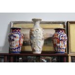 A pair of early 20th century Chinese Imari vases with ribbed decoration,