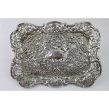 A Victorian hallmarked silver dressing table tray of shaped rectangular form, pierced border,