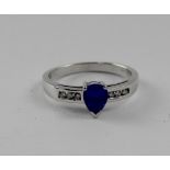 An 18ct white gold ring, marked 18kt,