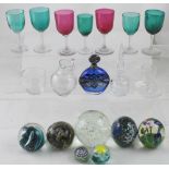 A collection of assorted glassware to include two Caithness paperweights,