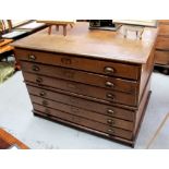 An early 20th century oak plan chest with six long pine-fronted drawers, 119 x 88 x 85cm.