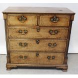 A 19th century inlaid walnut Davenport, the fall front enclosing drawer above four further drawers,