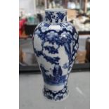 A Chinese blue and white porcelain Maping vase decorated with panels of figures inset between