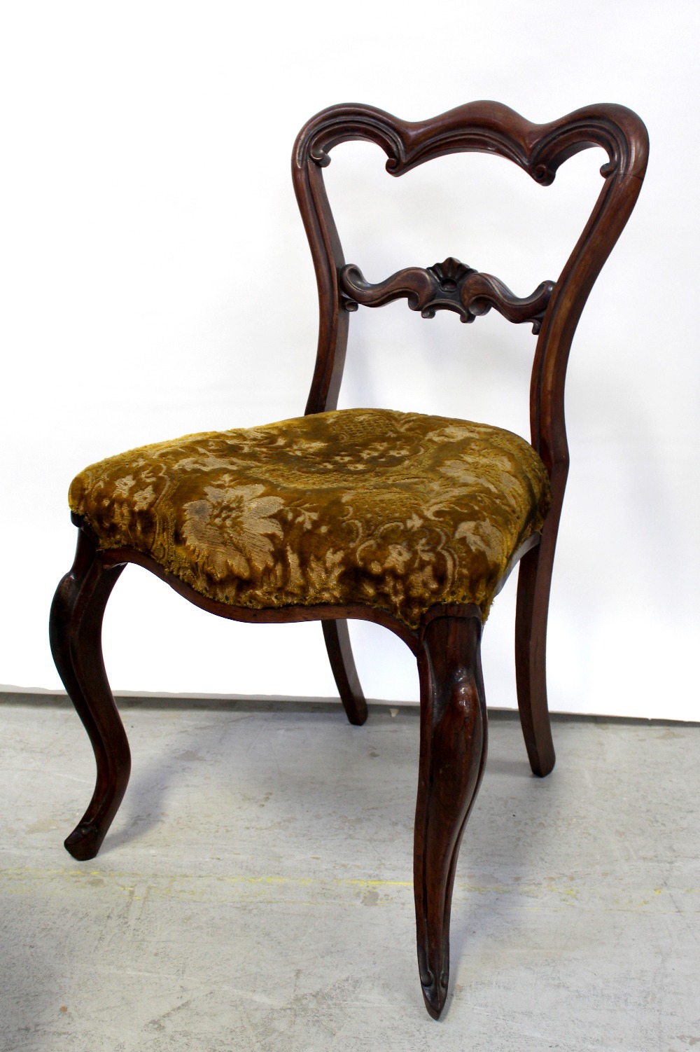 A Victorian walnut balloon-back chair and a 1930s carved oak blanket box (2).