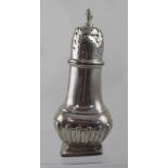 An Edward VII hallmarked silver sugar sifter, the lower body with gadrooned decoration,