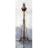 A Victorian brass and copper telescopic standard oil lamp, later converted to electric,