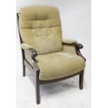 A modern wooden-framed armchair upholstered in woven cream material with button back,