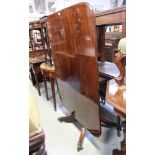 A Victorian mahogany tilt-top breakfast table, raised on outswept supports, length 125cm.