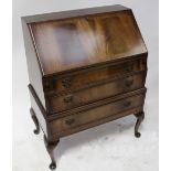 A reproduction Georgian mahogany bureau.