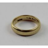 An 18ct yellow gold wedding band, size P, approx 7.2g.