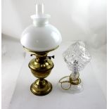 A cut glass mushroom lamp and a brass oil lamp with milk glass shade, height 51cm (2).
