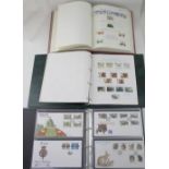 Three albums containing modern stamps on hinged brackets, mostly UK,