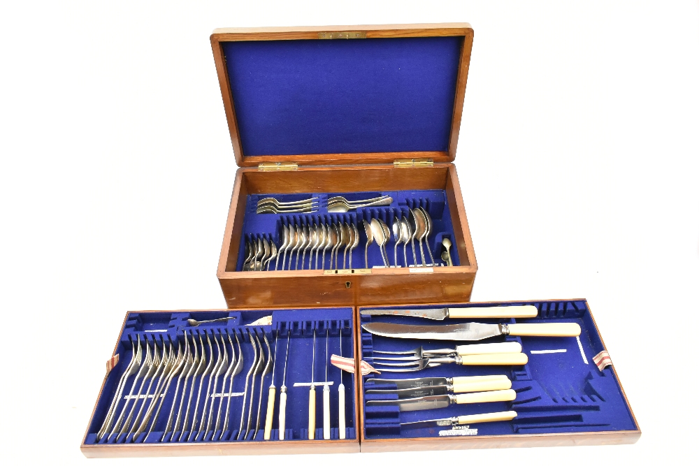 An oak cased canteen of electroplated cutlery.