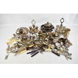 A mixed group of electroplated including lose flatware, dishes, egg stand, toast rack, etc.