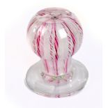 CAPE COD; a Crown paperweight with internal latticino decoration with rose crown to base, height