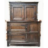 WITHDRAWN An 18th century and later oak cabinet on stand, the bottom section with two panelled