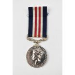 A George VI WWII Military Medal, unnamed as awarded to foreign recipients.