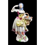 MEISSEN; a mid-18th century figure of 'The Pastry Seller' from the 'Cris de Paris' series,