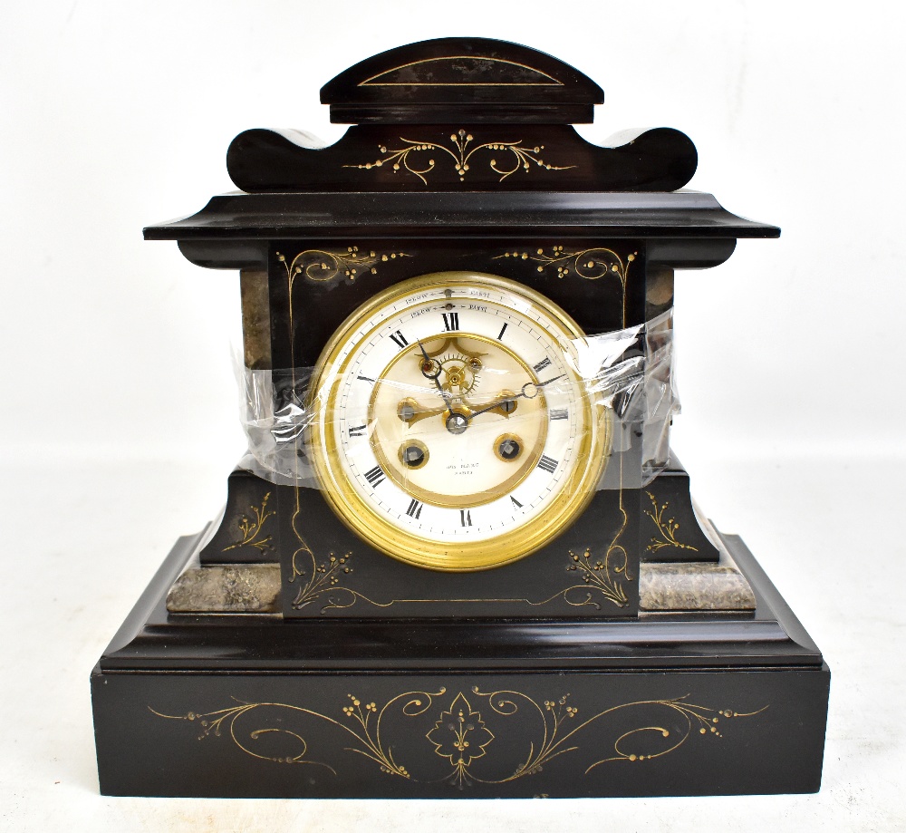 A Victorian marble and slate mantel clock, the circular white enamel dial set with Roman numerals