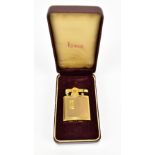 RONSON; a 9ct yellow gold mounted 'Princess' P430 cigarette lighter with engine turned detail,