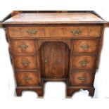 A lady's Edwardian mahogany crossbanded seven drawer writing desk, width 80cm.Additional