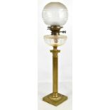 A 19th century brass Corinthian column oil lamp with etched opaque and clear glass shade, clear