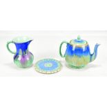 SHELLEY; a 'Harmony' drip wear teapot on stand and cream jug, printed marks to bases, height of