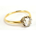 A yellow metal diamond solitaire ring, the claw set brilliant cut stone weighing approx 0.75cts,