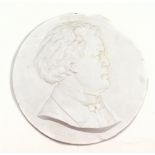 L STEINMAN; a plaster roundel depicting the profile portrait bust of a gentleman, signed and dated