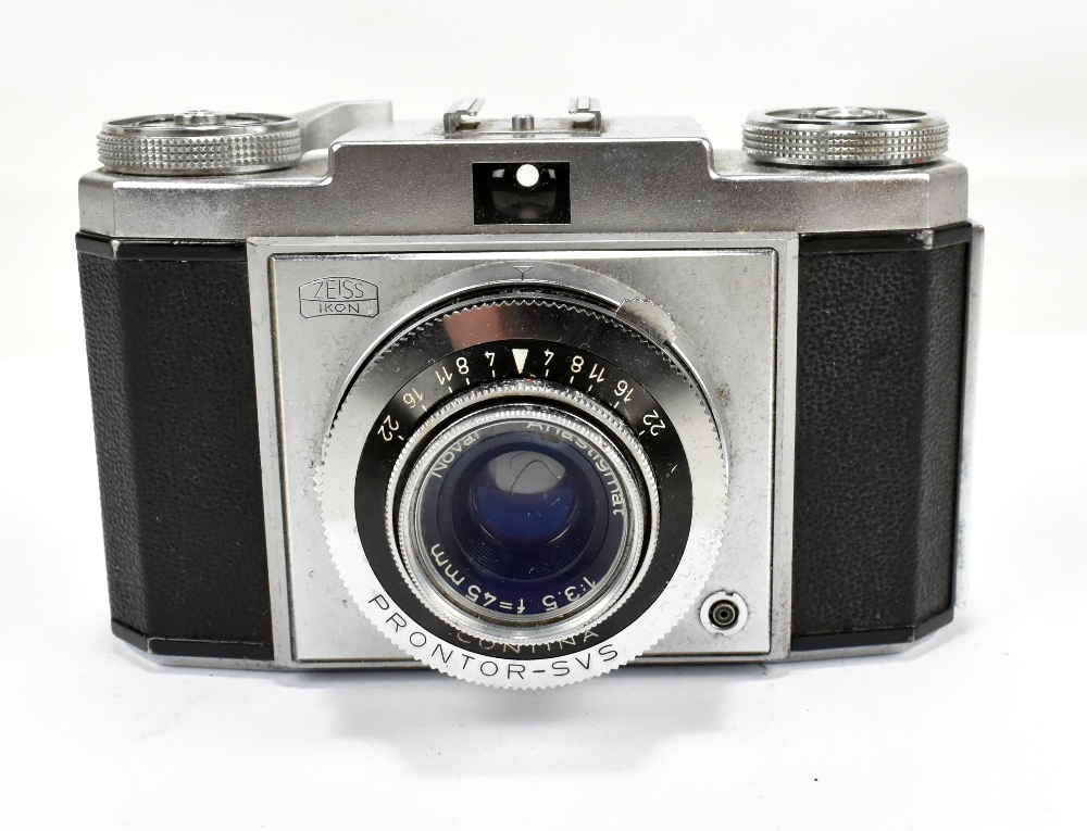 ZEISS; a Contina camera, with Novar Anastigmat 1:3,5 F=45mm lens, cased.