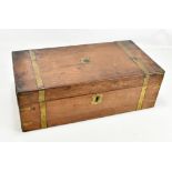 A Victorian brass bound mahogany writing slope, the hinged cover enclosing slope and compartment,