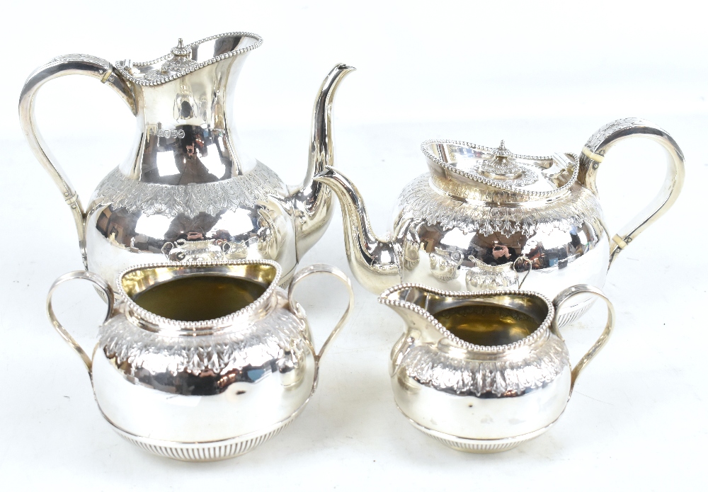 MARTIN HALL & CO; a good Victorian hallmarked silver four piece tea service with bead decorated rims