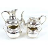 MARTIN HALL & CO; a good Victorian hallmarked silver four piece tea service with bead decorated rims