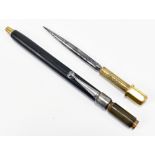 A WWII Special Operations Executive brown pen with concealed spike, one section stamped 'patent',