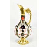 ROYAL CROWN DERBY; a ewer decorated in pattern number 1128, height 25.5cm.Additional