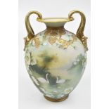 NORITAKE; a floral decorated gilt heightened twin handled vase, printed marks to base, height 23.5cm
