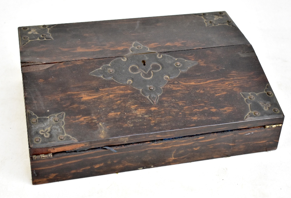 A late 19th century coromandel lap desk with Gothic metal mounts, with fitted interior and blue