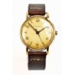 LONGINES; a gentleman's 9ct yellow gold cased mechanical wristwatch, the circular dial set with