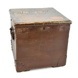 A 19th century stained pine twin handled travelling chest with iron mounts and twin handles,