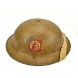A WWII British Desert Rat Brodie helmet with rare original decal, with leather liner to interior,