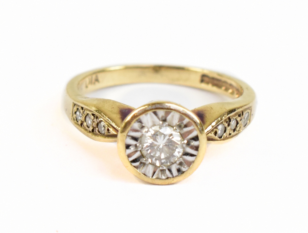 A 9ct yellow gold illusion set diamond solitaire ring, the diamond weighing approx 0.20, size I,